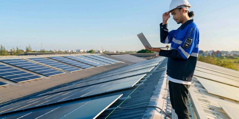 specialist-technician-professional-engineer-with-laptop-tablet-maintenance-checking-installing-solar-roof-panel-factory-rooftop-sunlight-engineers-holding-tablet-check-solar-roof